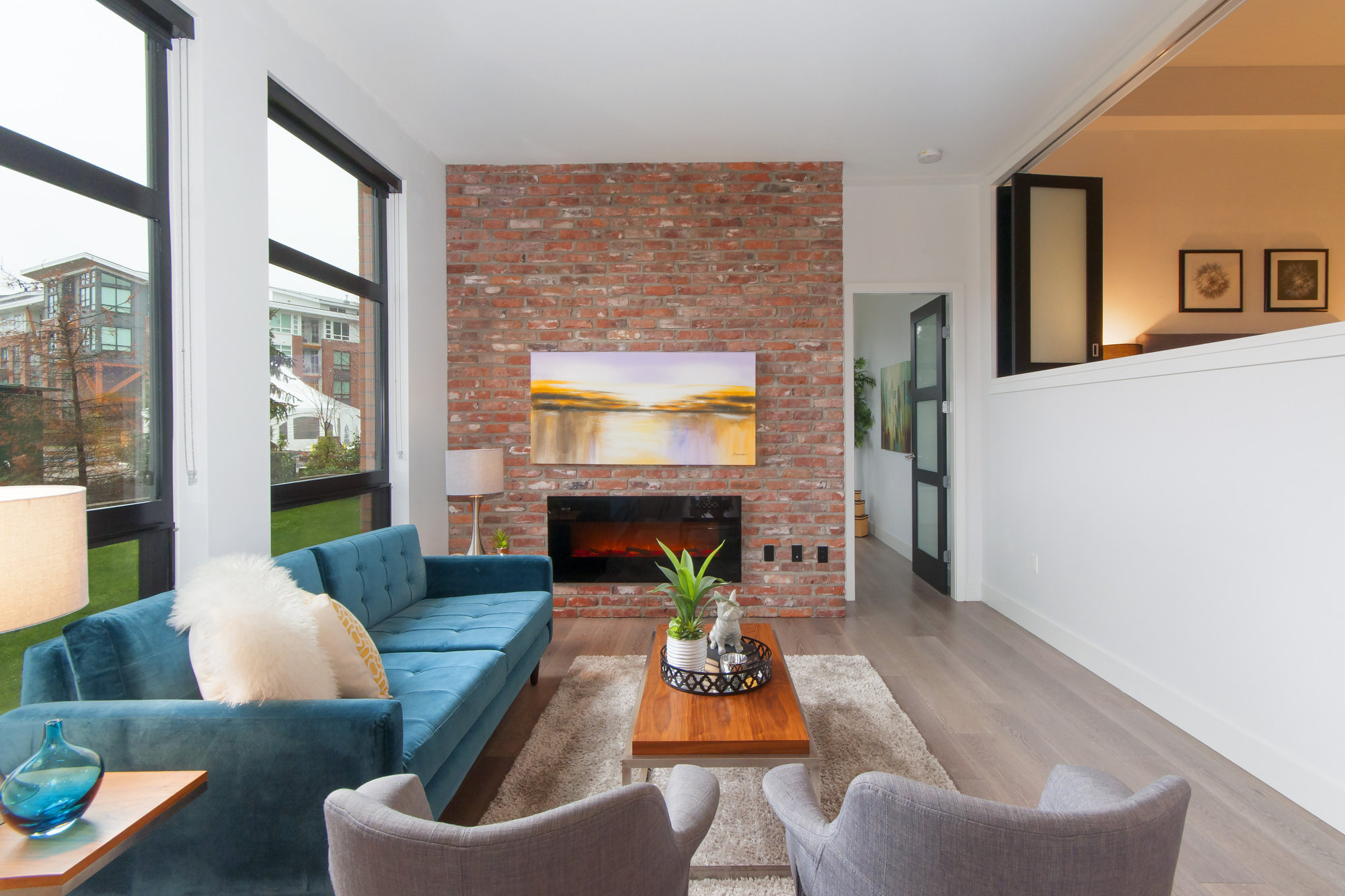 Interior shot of a living room with a fireplace